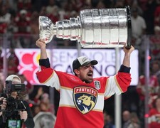 Brad Marchand Lifting the Cup Florida Panthers NHL Hockey  8x10 reprint