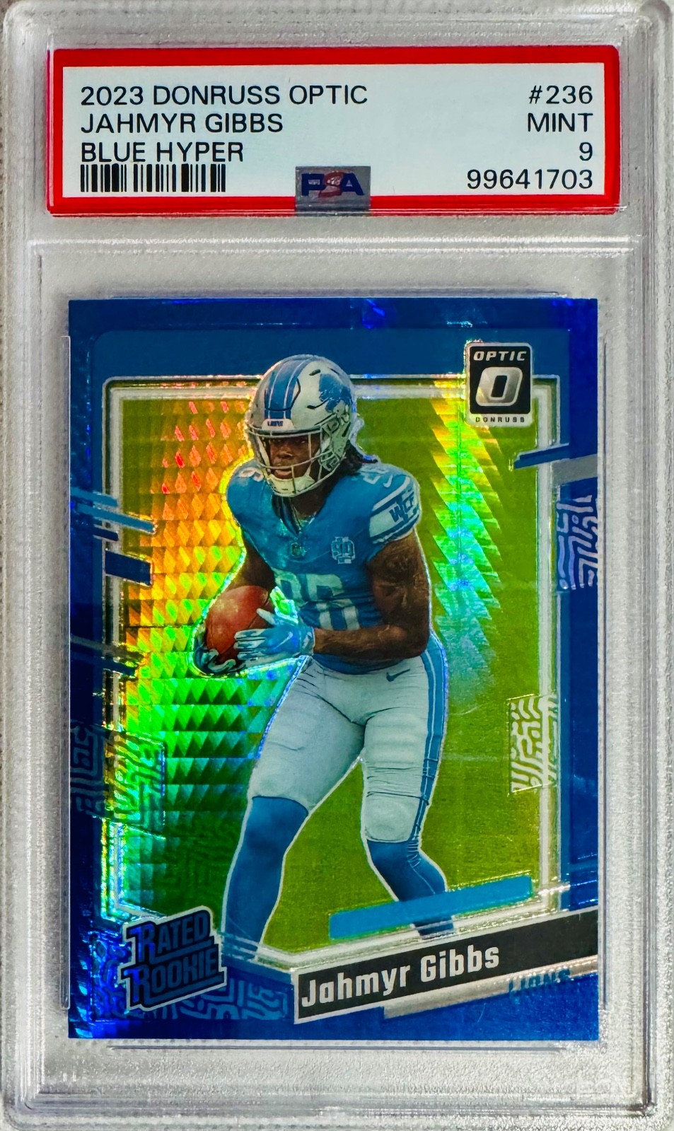 2023 Donruss Optic Jahmyr Gibbs Rated Rookie RC Blue Hyper Prizm #236 PSA 9 MINT
