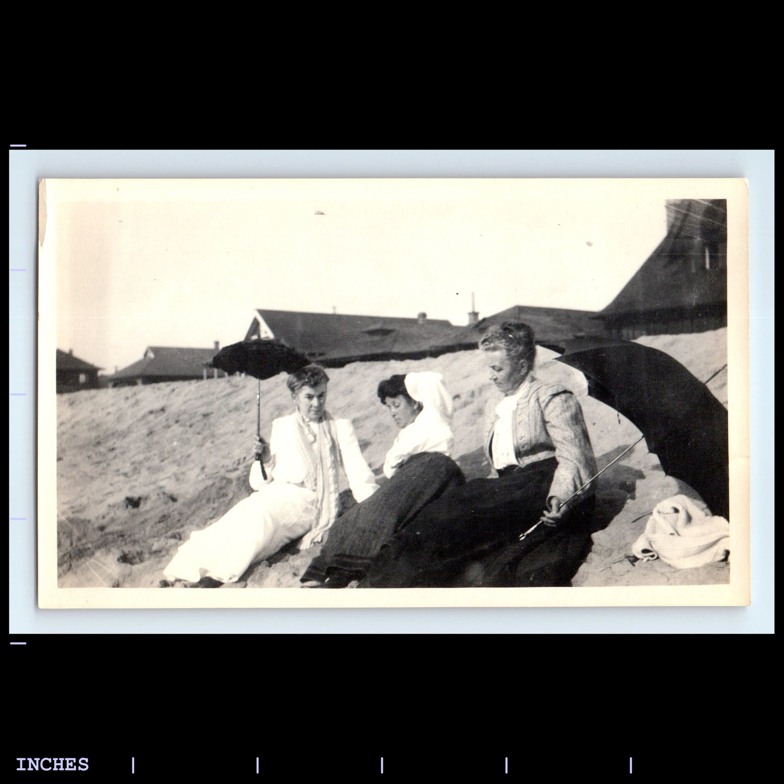 Victorian era women at beach holding parasols vintage photo