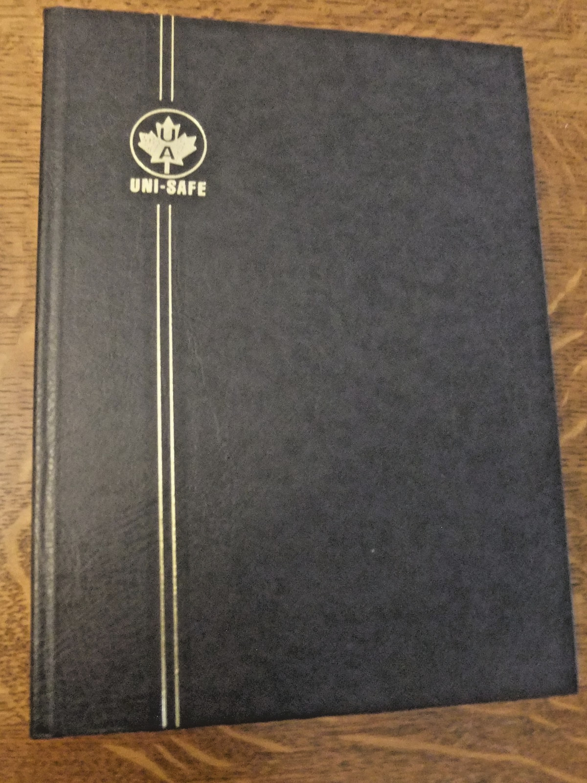 Large UNI-SAFE Stamp Album, Style W 4/16, Black, Lightly Used