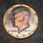 1974-D Kennedy Half Uncirculated More Pale in Hand - Exact Coin Shown #R189