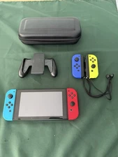 Nintendo Switch + Extra Joycons + Grip + Carrying Case