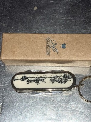 Avon Collectable Running Wolves Pocket Knife Keychain Multi-Function Knife NEW