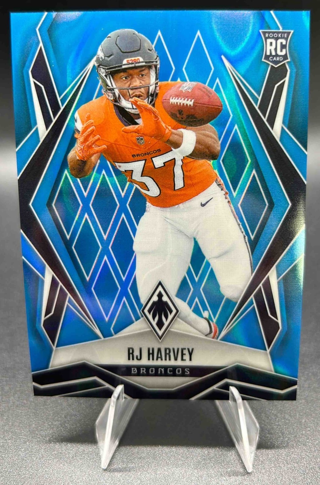 2025 Panini Phoenix RJ Harvey #176 Light Blue Lava 239/325 RC Broncos