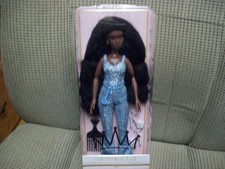 Liya, Naturalistas 11.5" Doll with Long Natural Hair, Blue Outfit & White Heels.