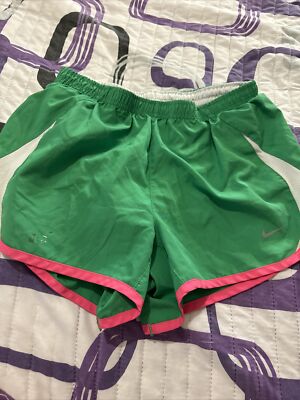 green and pink nike shorts