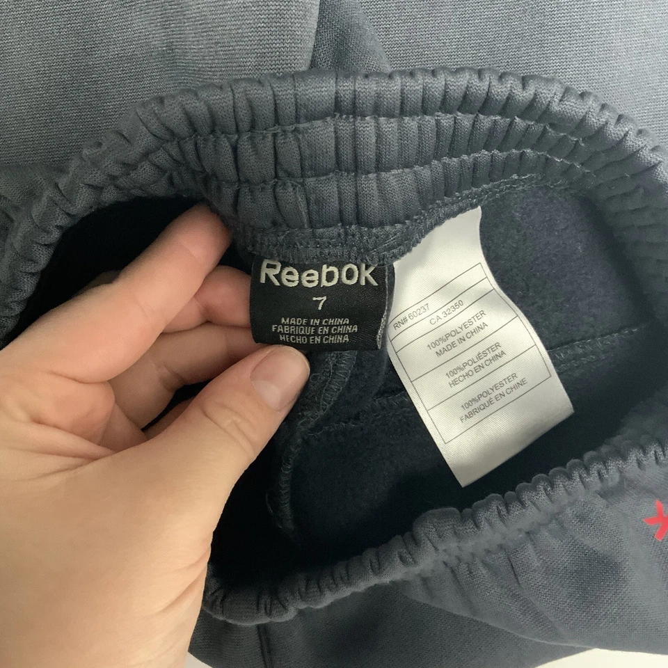 Pantalones deportivos Reebok niños gris cintura elástica talla 7 Foto 3 de 4