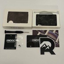 The Ridge Wallet Forged Carbon Money Clip w/ Screwdriver Screws used