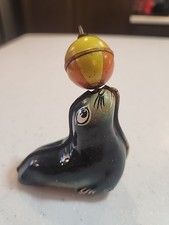 1960s Lehmann AHA 910 Western Germany Friction Metal Toy Seal With Ball