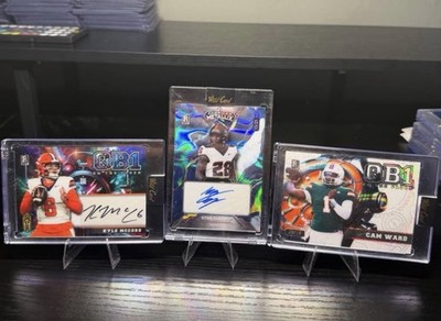WILD CARD QB1 & METALLICX FOOTBALL AUTOGRAPH LOT (MCCORD, OLADAPO, WARD)
