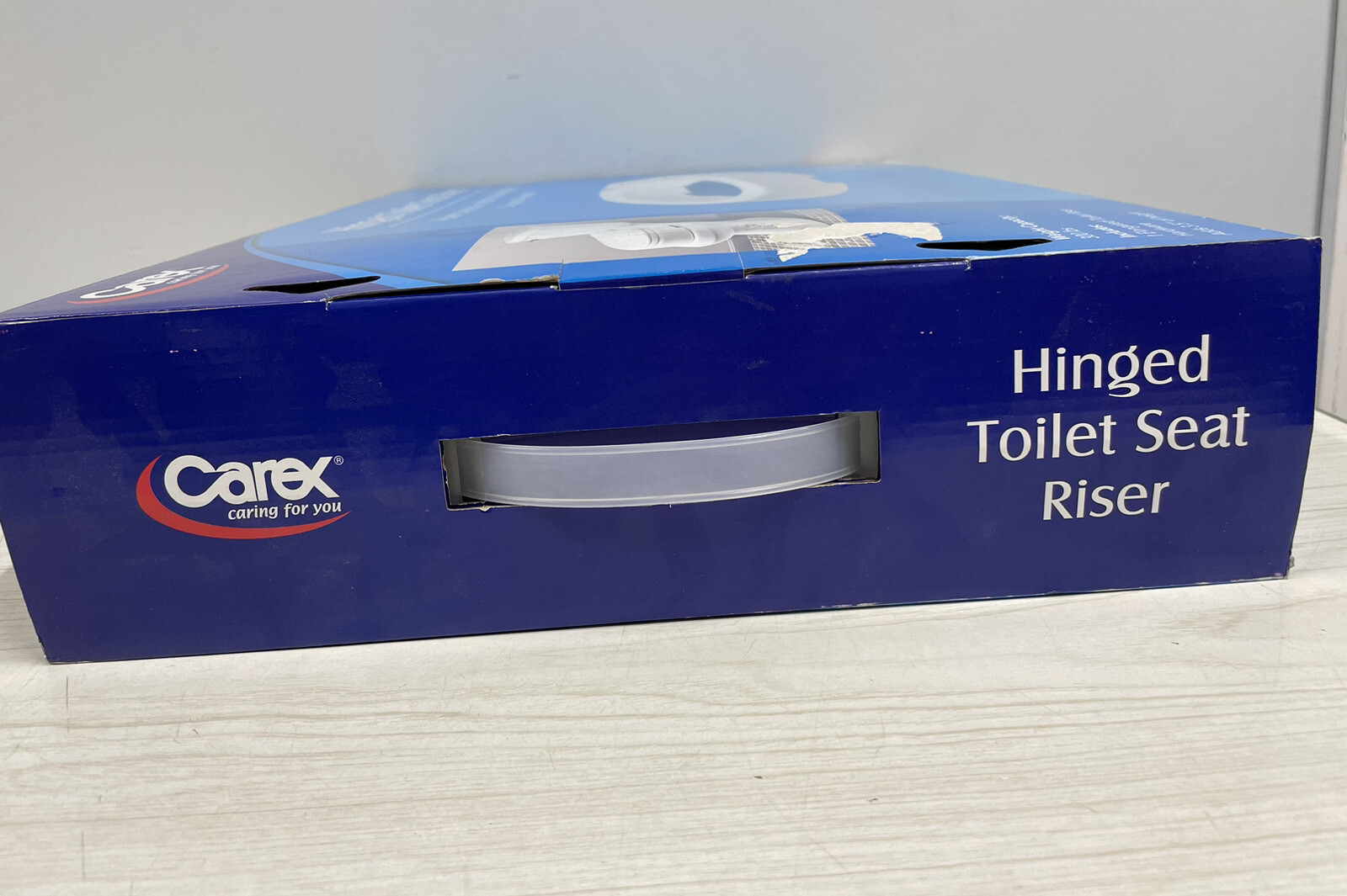 Carex Health Brands Hinged Elongated White Raised Toilet Seat Riser