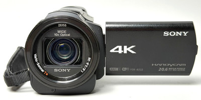 Sony FDR-AX33 4K Handycam - Zeiss Objektiv - Balanced OSS - Akku + 128GB SD