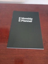 2025 Black Paperboard Cover Monthly Planner 32 Pages 6.75 X 9.5 In. 