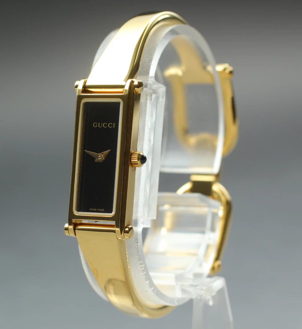 [Presque comme neuve+++] Montre femme Gucci 1500L cadran noir doré 12 mm quartz JAPON