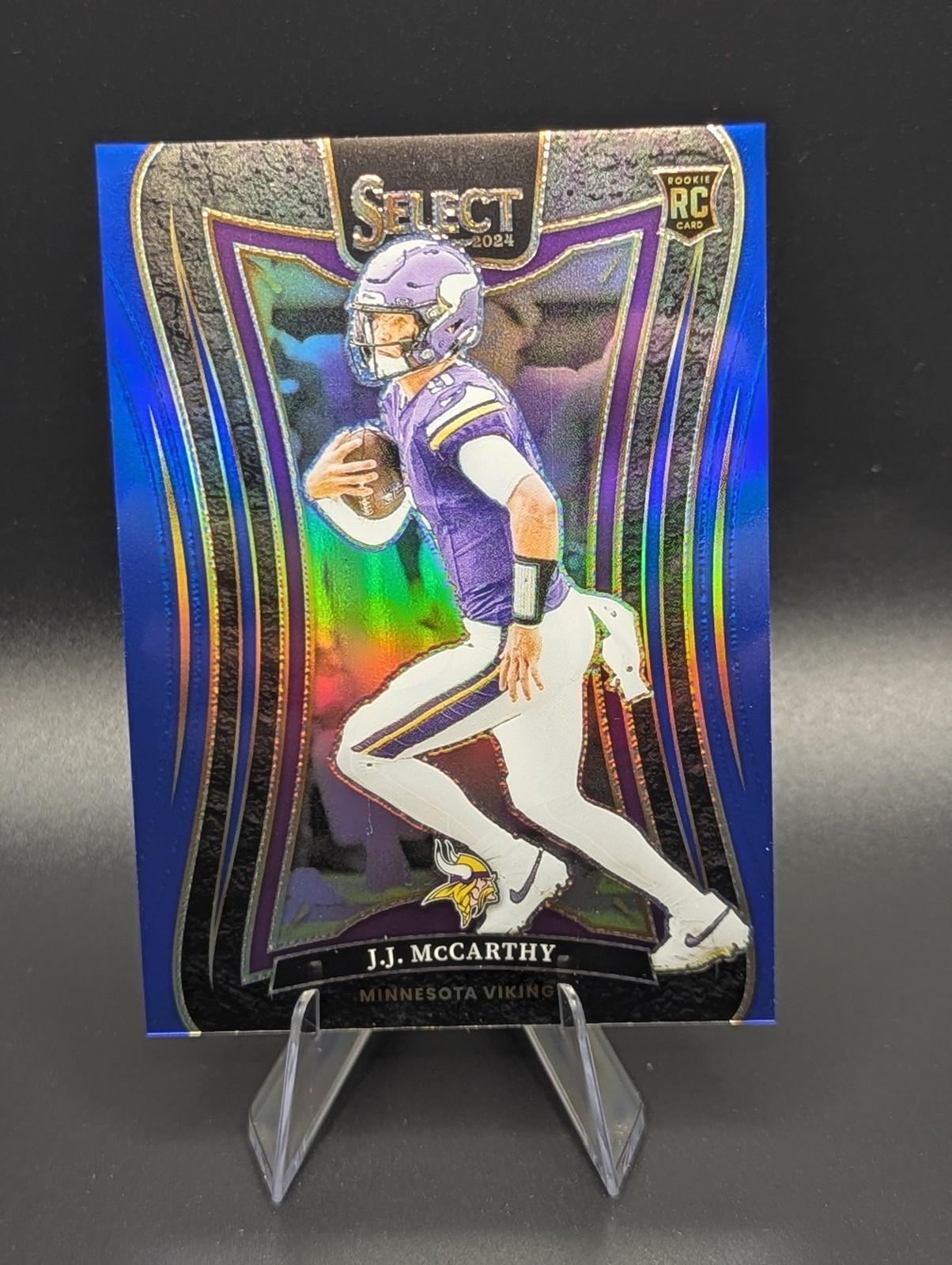 2024 Select Football JJ McCarthy RC - SUITE LEVEL BLUE PRIZM /99 - Vikings SP