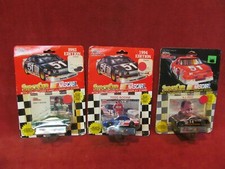 RACING CHAMPIONS DIECAST  CARD 1993 BRETT BODINE 1994 TODD BODINE A J FOYT
