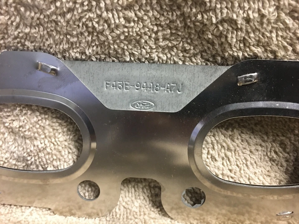 NUEVO FORD MERCURY F43E-9448-AJ7 1998-2001 COUGAR 2.5V6 JUNTA COLECTOR ESCAPE  Foto 2 de 4