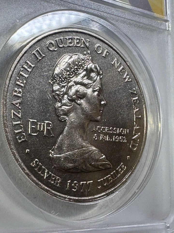 Nueva Zelanda 1977 1 dólar calificado como nuevo 68 por ANACS Waitangi Day Foto 2 de 4