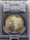 1878s MORGAN SILVER DOLLAR PCGS MS66. OBVERSE HAS A LIGHT GOLD COLOR TONE TO IT.