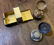 THREE ANTIQUE LEATHER COVERED TRAVELLING INK WELLS…