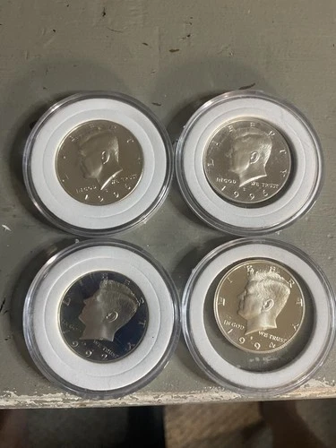 Nice Lot Of 4 Proof 90 % Kennedy Half Dollars.