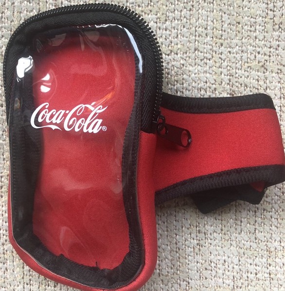 COCA COLA FUNDA BRAZALETE NEOPRENO MOVIL SMARTPHONE  Nuevo
