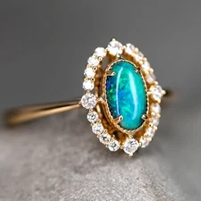 Engagement Ring: Australian Boulder Opal and Diamond in 18K Yellow Gold