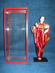 oriental dolls in glass cases