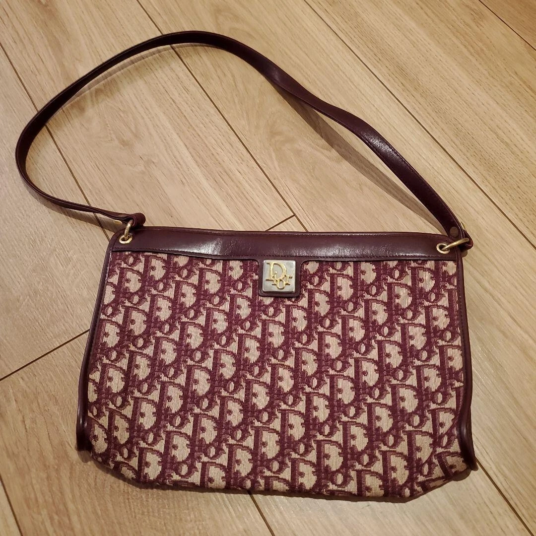 Sac à main bandoulière motif trotteur Christian Dior bordeaux vintage 202412M