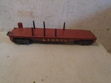 lionel 6311 flatcar w/6 stakes clean no rust couplers work excellent condition