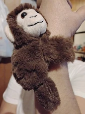 1 very cute wrist hugger RN#22195 made for best brands sales company LLC. UNISEX