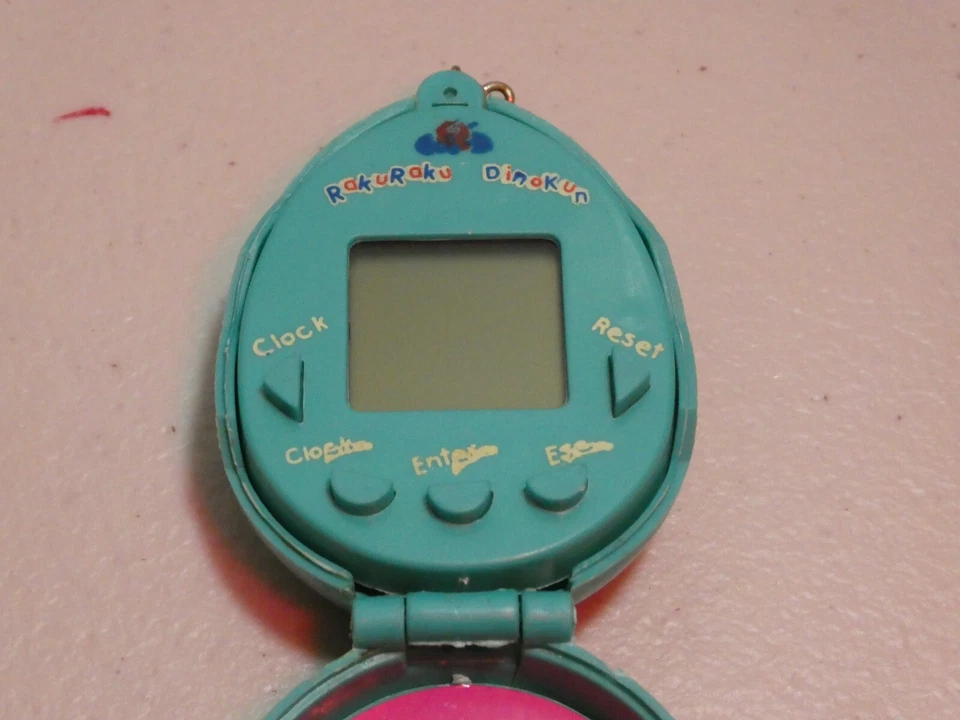 RakuRaku Dinokun dinkie dino egg Virtual Pet Giga Pets tamagotchi digimon - image 2 of 4