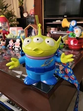 DISNEY TOY STORY , ALIEN SIPPER CUP WITH STRAW AND STRAP.