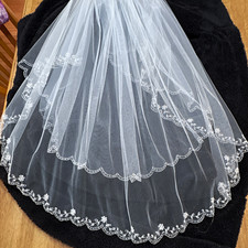 White Fingertip Wedding Veil that was featured in WV bride magazine 2017. Double