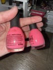 Color Secrets Professional nail polish bottles in a vibrant hot pink color. — photo 3