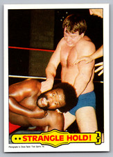 1985 TOPPS WWF #40 STRANGLE HOLD! W/ROWDY RODDY PIPER & JUNK YARD DOG