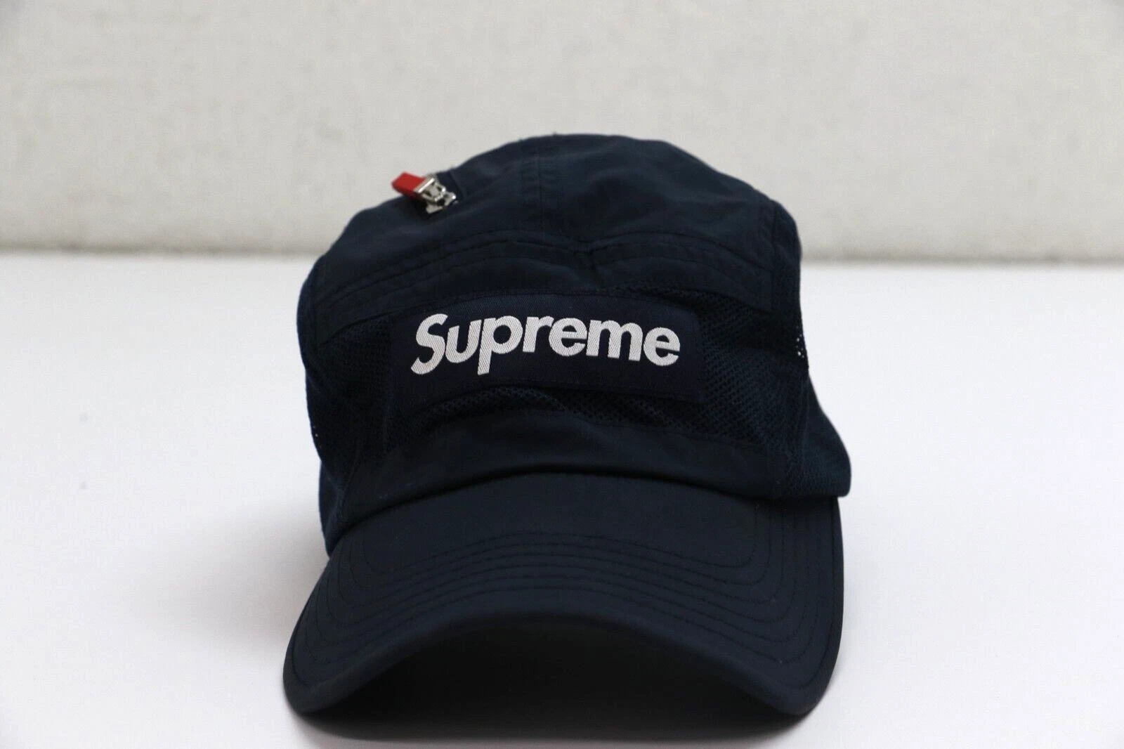 Casquette de camp en maille zippée suprême bleu marine (FW20)