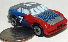 Small Micro Machine Plastic Pontiac Grand Prix  Race Car in Red & Bllue # 7 ACE