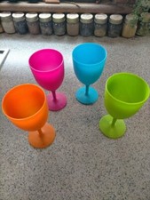 Used Plastic Drinking Cups in Four Different Colours