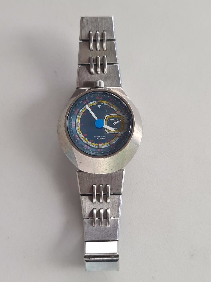 BLUE SEIKO AKA ALBA BULLHEAD UFO V707-0A10 DATED FEBRUARY