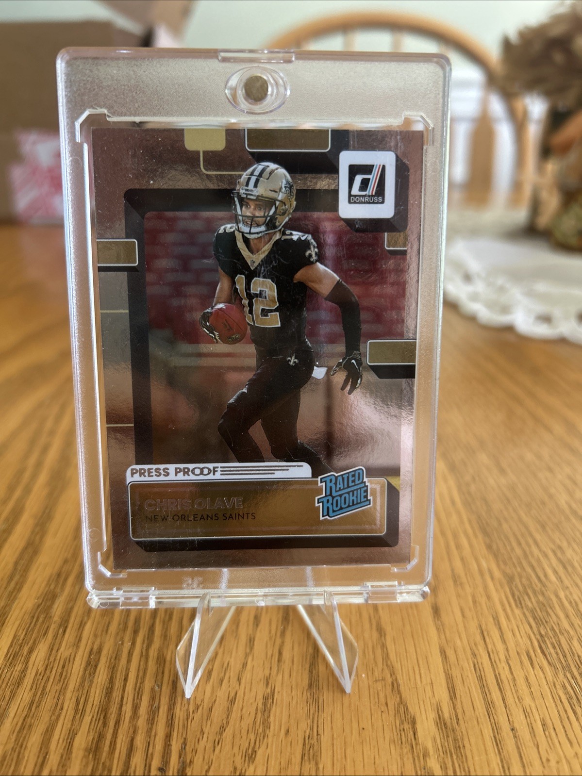 2022 Panini Donruss Rated Rookie Chris Olave #309 Press Proof Silver /100 (RC)