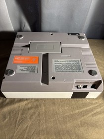 Nintendo NES Gray Video Game Console With Controller, Cords, And Mario Bros. 3