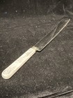 Treasure Masters SHEFFIELD England Stainless Steel serrated Knife PEARL  lucite — photo 1