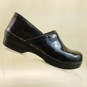 sanita patent leather clogs