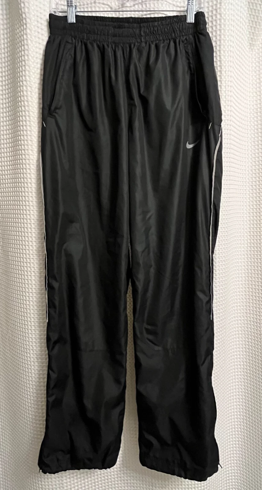 Nike Storm-FIT Pants Mens Med Run Golf Rain Athletic Black Loose Fit Zip Ankle