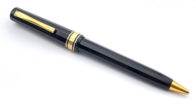 VINTAGE OMAS GENTLEMAN BALLPOINT PEN IN FACETED BLACK AND GOLD MADE IN ITALY