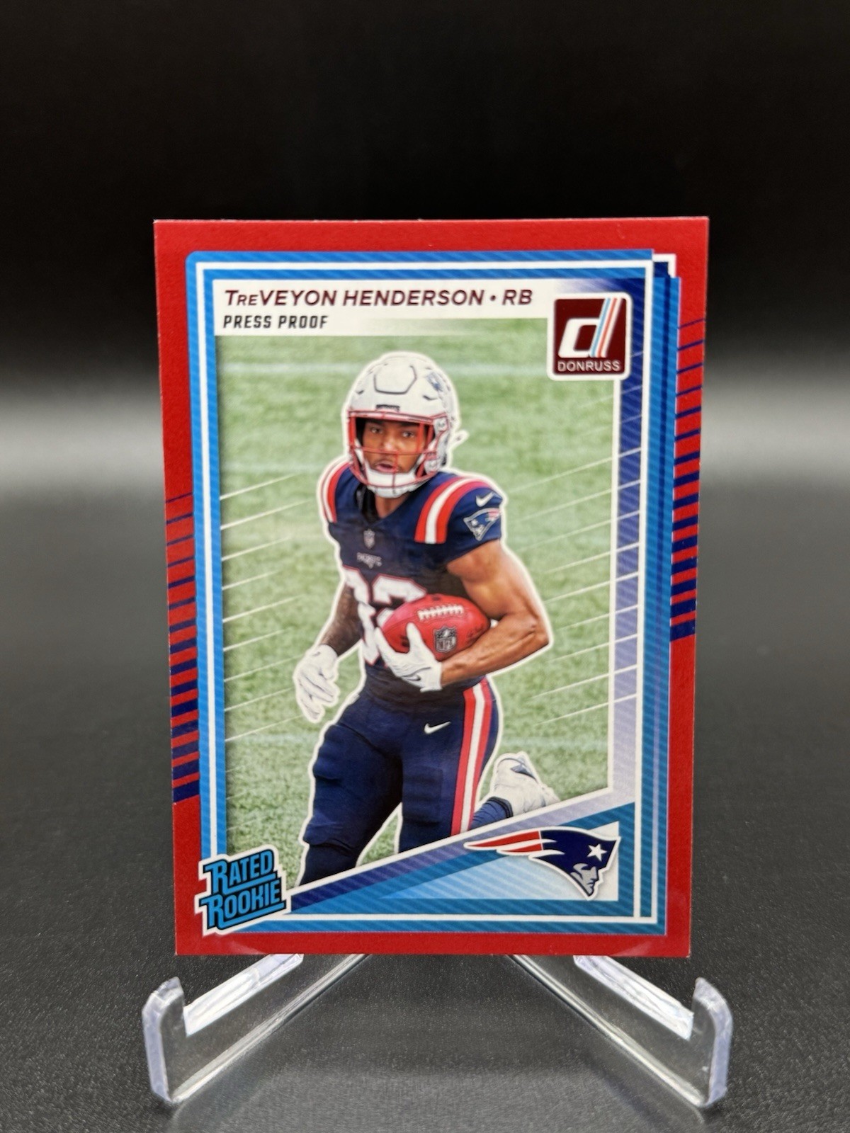 2025 Donruss  Rated Rookie TreVeyon Henderson #332 Press Proof Red (RC) Patriots