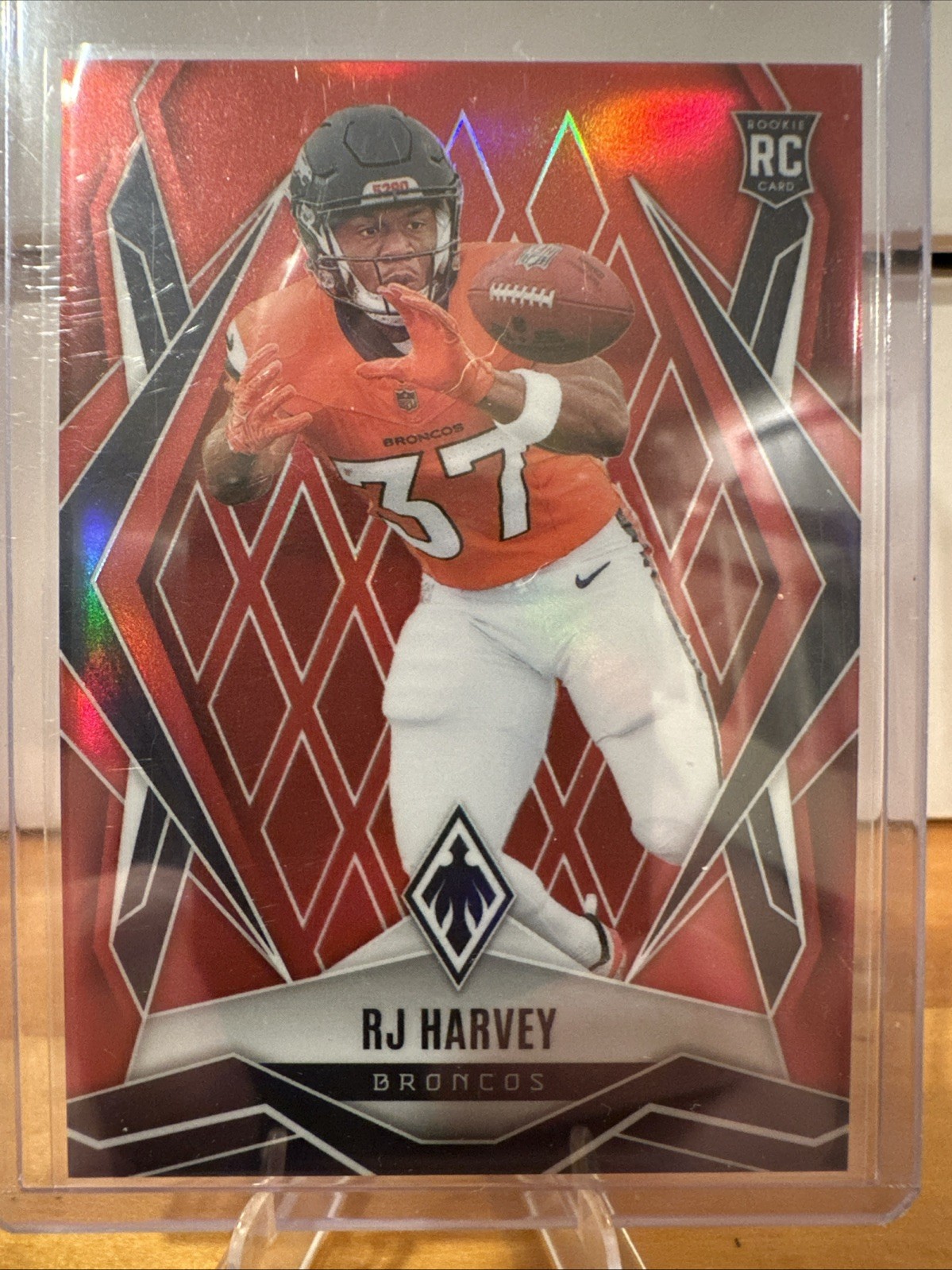 2025 Panini Phoenix- RJ Harvey Red /99 (RC) Denver Broncos #176