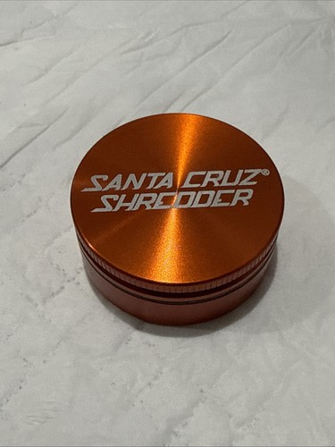 Santa Cruz Shredder 2 Piece Grinder. Metallic Orange. Clean.
