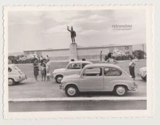 Lineup of Fiat 750s Posing Below the Iconic Spartan Monument Unusual Snapshot